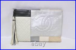 CHANEL Clutch Bag Patchwork Leather Beige Silver White Black CC Logo Tassel Auth