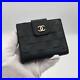 CHANEL-Icon-Bifold-Wallet-with-Hook-Black-Embossed-Leather-Gold-CC-Logo-Auth-01-tag