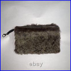 Pre-loved auth CHANEL small brown SHEARLING zip top POCHETTE on leash CLUTCH